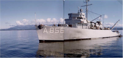 Mercuur (3), probably Norway 1974. The black spots on the hull indicate that a submarine (laying alongside in order to transfer torpedoes) has been running her diesels in order to re-charge her batteries. Also note the crane and dingy at the stern.  (Photo: © Collection J.J. Kragten).